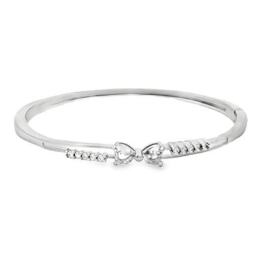 Elegant silver bangle with diamond hearts