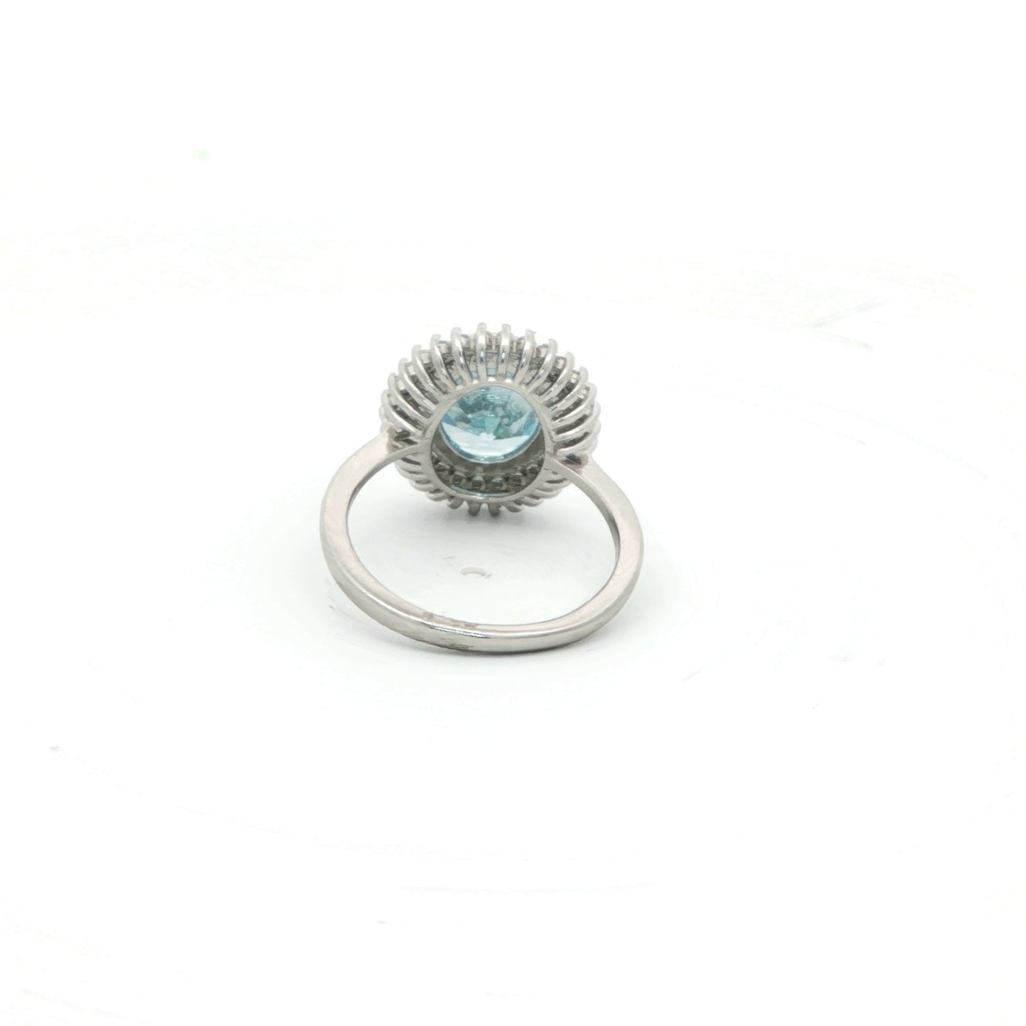 Elegant aquamarine and diamond halo ring