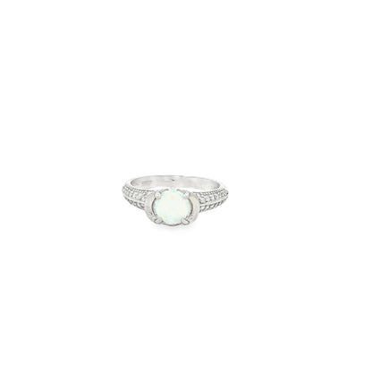 Elegant opal and diamond ring close-up