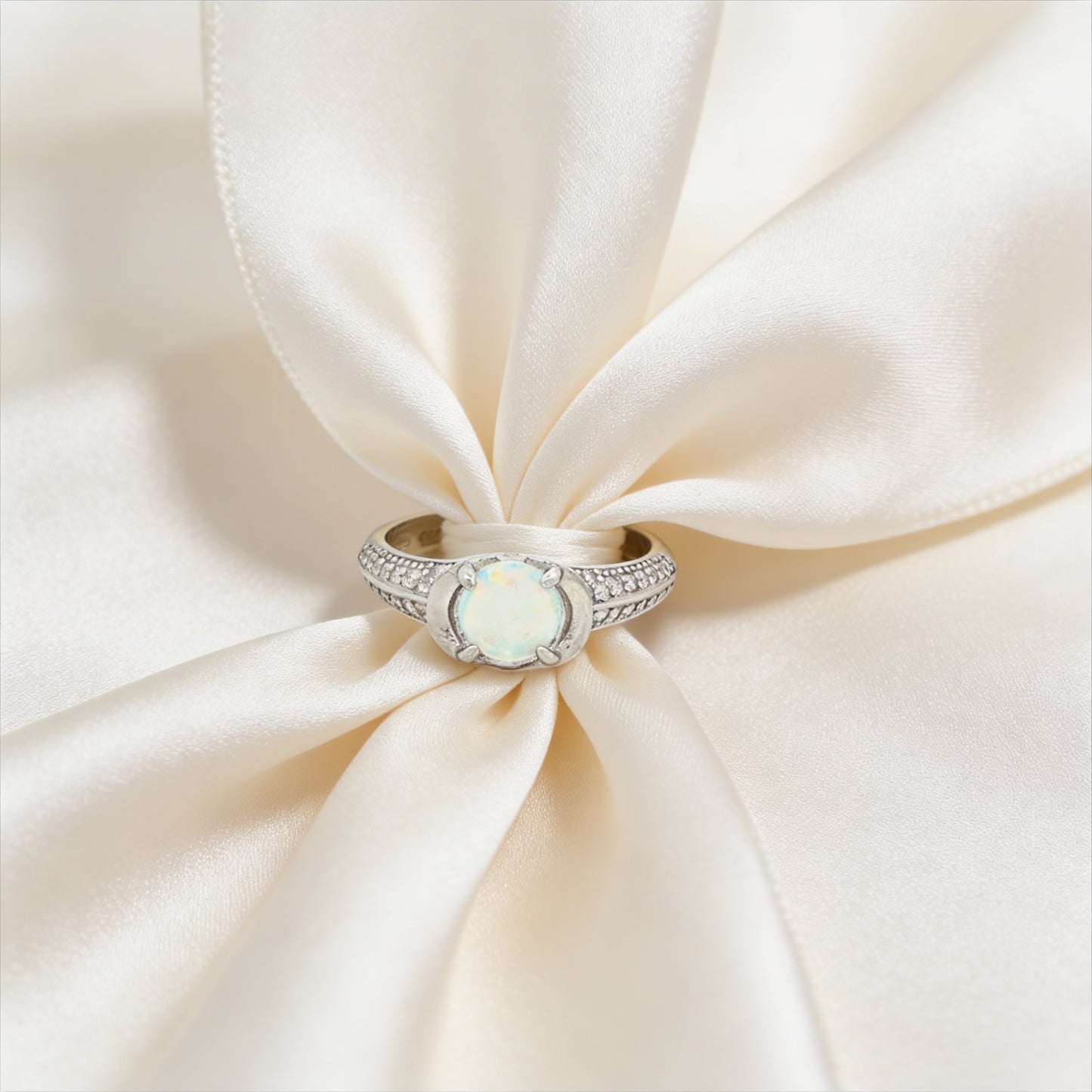 Elegant opal and diamond ring close-up