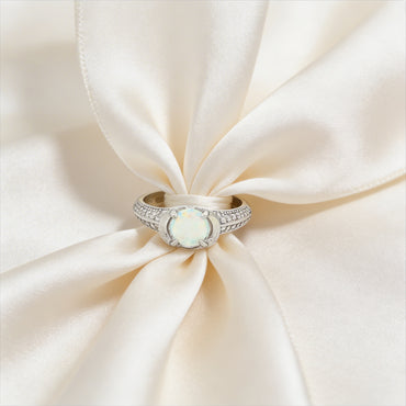 Elegant opal and diamond ring close-up
