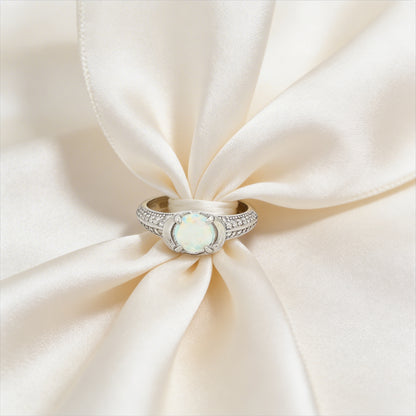 Elegant opal and diamond ring close-up