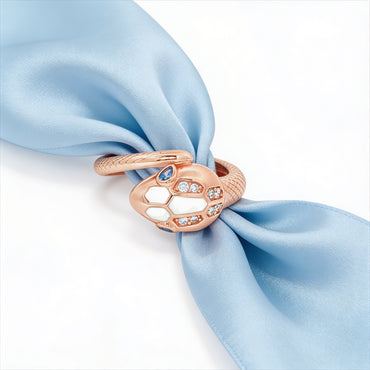 Rose silver snake ring with sapphire eyes