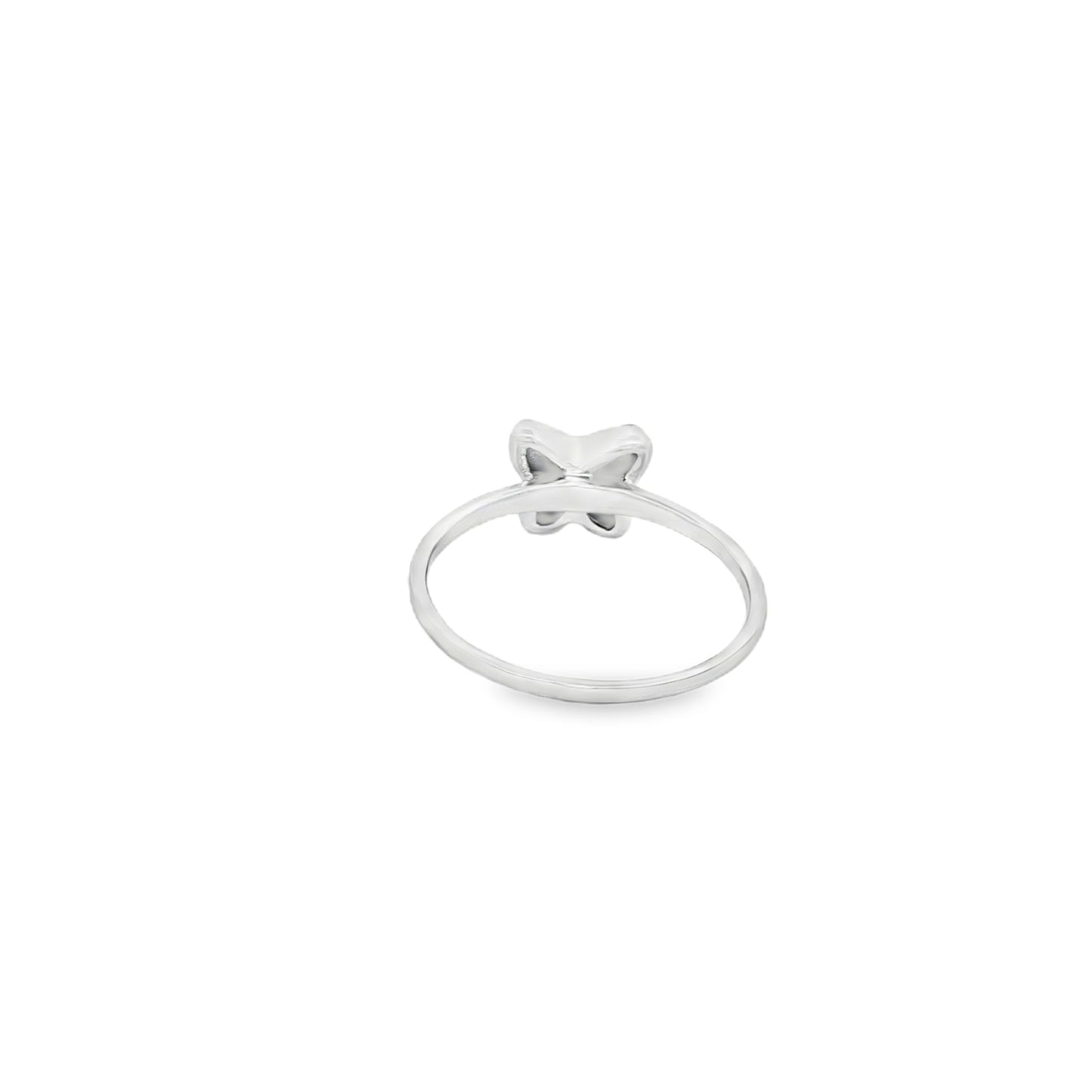 Delicate butterfly ring on fabric