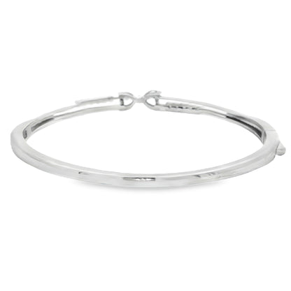 Elegant silver bangle with diamond hearts