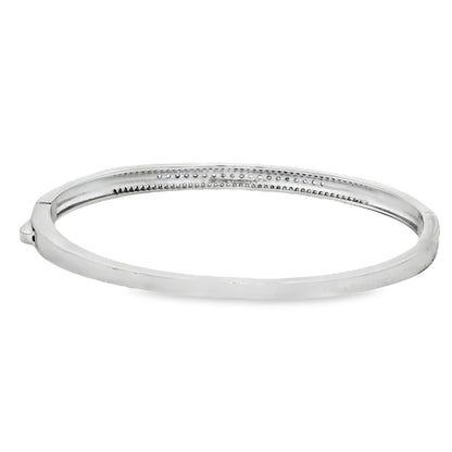 Elegant diamond bangle with crossover design