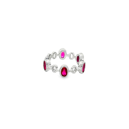 Oval-cut ruby and pink stones for a vibrant contrast