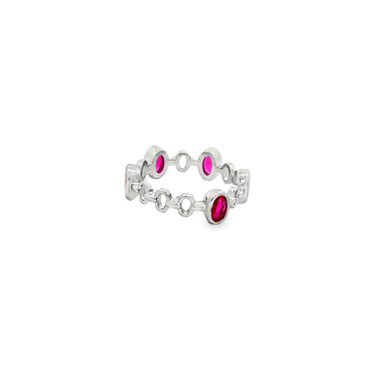 Oval-cut ruby and pink stones for a vibrant contrast