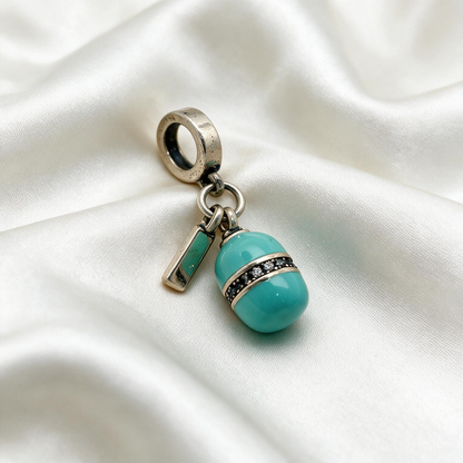 Turquoise Egg-Shaped Charm with Name Tag