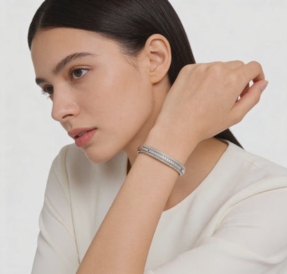 Elegant diamond bangle with crossover design