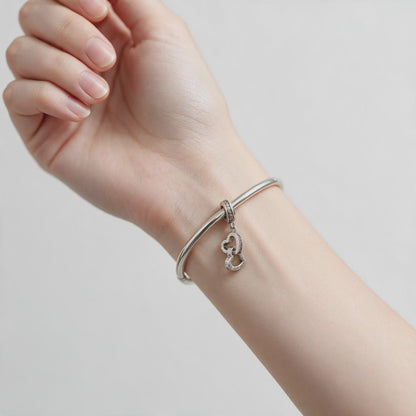 Interlocking Hearts Charm